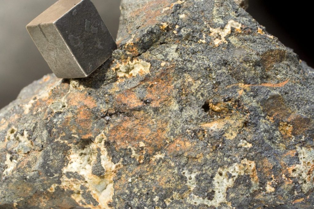 lodestone rock with magnet on it