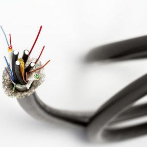 multi-conductor cable with fiber optic cables incorporated with it